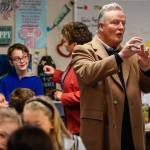 Seth Haney (left) talks with his teacher, Kimberlee Spaetig-Peterson, in her classroom at Riverview Elementary in Snohomish while Wonder Media CEO Terry Thoren explains his companys Story Maker technology. (Dan Bates/The Herald)