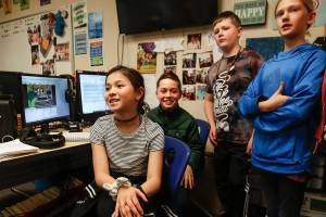 Students at Riverview Elementary in Snohomish, (from left) Kalista Nguyen, Cade Yoder, Keagan Ard and Izzy Clare explain Wednesday how they used Story Maker technology to help make an animated movie, The WonderGrove Wizard of Oz. The project was part of their work in teacher Kimberlee Spaetig-Petersons class. (Dan Bates / The Herald)