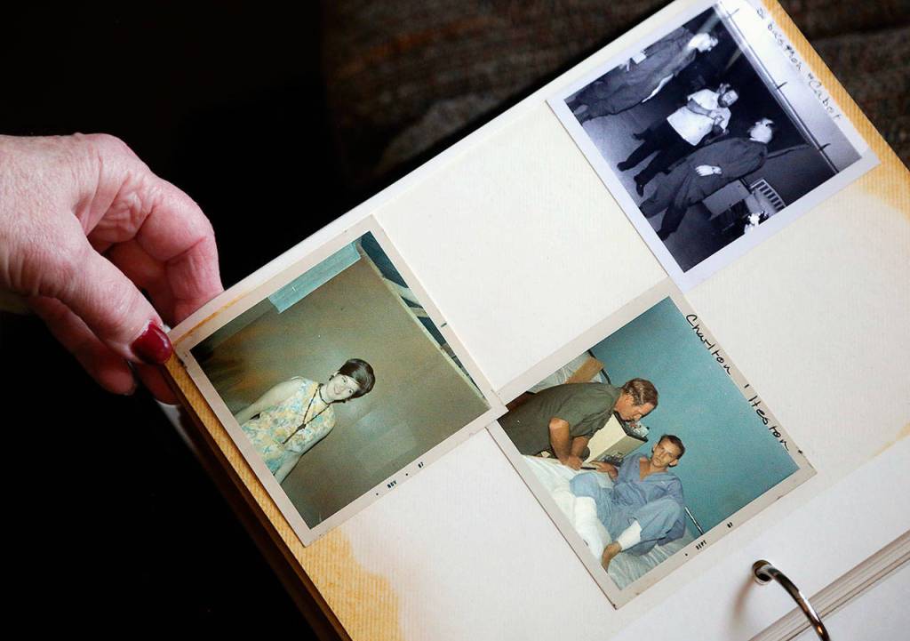 Among Darlene Harringtons Vietnam scrapbook mementos are photographs of actors Charlton Heston, Sebastian Cabot and other celebrities visiting the wounded in the 24th Evacuation Hospital at Long Binh, where the Army nurse was based. (Courtesy Darlene Harrington))