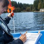 Deb Kocher is one of 73 volunteers monitoring 31 lakes through a Snohomish County Surface Water Management program. (Lizz Giordano / The Herald)