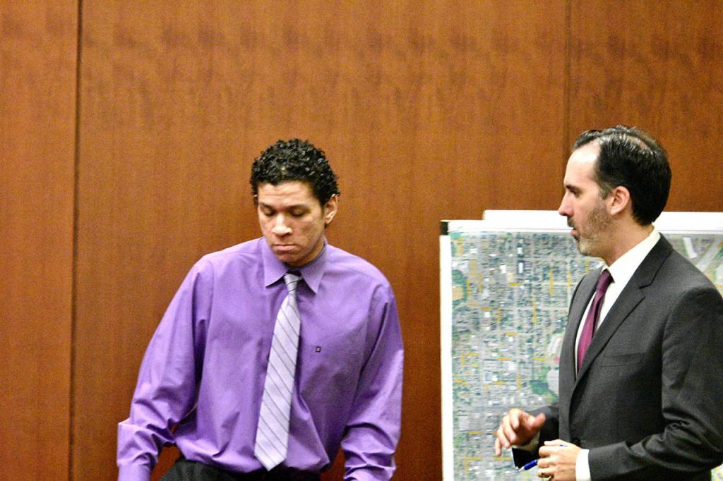 Matthew McGowan (left) steps down after answering questions from his attorney Derek Conom about where he was on the morning of New Years Day 2019. (Caleb Hutton / The Herald)