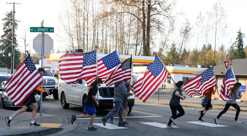 Kids of Granite Falls run in support of veterans mental health and support Friday afternoon in Granite Falls. (Kevin Clark / The Herald)