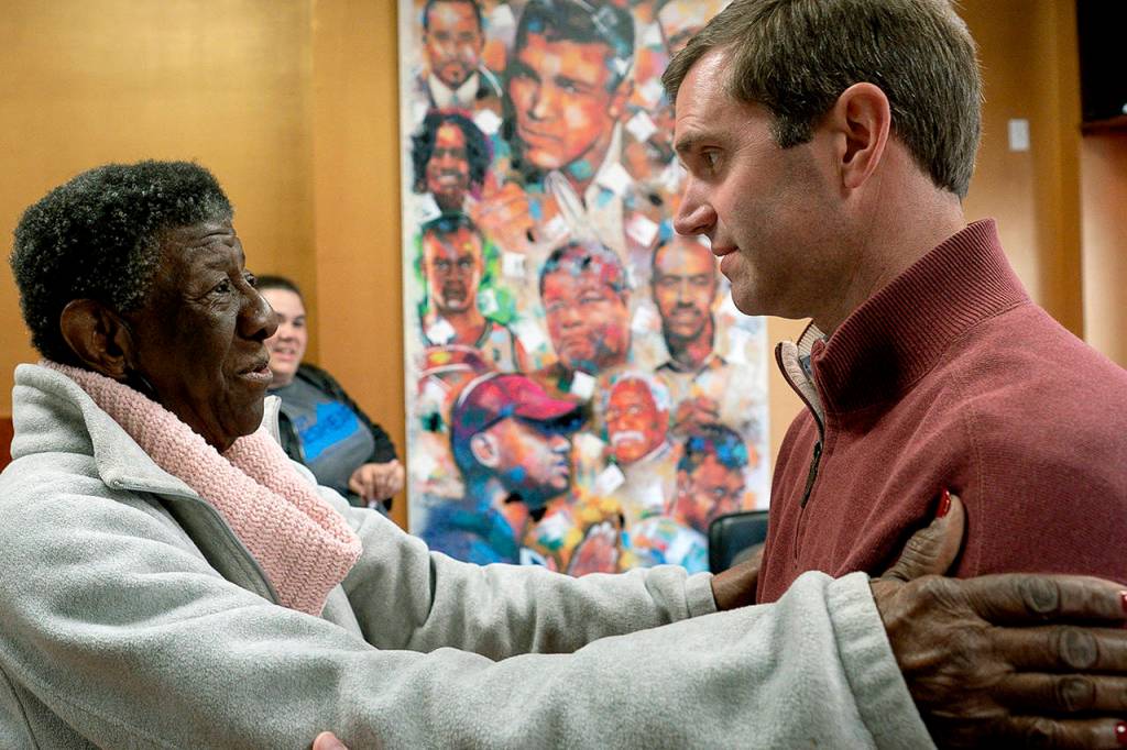 Kentucky Attorney General and Democratic gubernatorial candidate Andy Beshear speaks with Maddie Jones, of West Louisville, during a campaign stop at Southern Hospitality on Tuesday in Louisville, Kentucky. (AP Photo/Bryan Woolston)