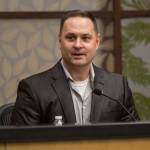 Snohomish County Sheriff candidate Adam Fortney speaks at the League of Women Voters Candidate Forum at the Snohomish County Campus on Oct. 7 in Everett. (Olivia Vanni / Herald file)