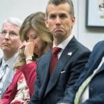 Susan Payne, founder and executive director of Safe2Tell wipes tears, as Peter Langman (left), Max Schachter (center), who lost his son, Alex, during the Parkland school mass shooting and Ryan Petty, who lost his daughter, Alaina ,during the Parkland school mass shooting, appear Thursday in Washington at the release of the Secret Service National Threat Assessment Centers Protecting Americas Schools report. The report examines 41-targeted attacks that occurred in schools between 2008 and 2017. (AP Photo/Cliff Owen)