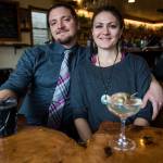 Owners Kris Kelnero, left, and Kali Kelnero with a Dark Arts and martini cocktails at Kelnero, the bar they opened in Edmonds this year. (Olivia Vanni / The Herald)
