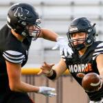 Gio Fregoso (right) hands off to Blake Rybar during practice Wednesday evening at Monroe High School on November 6, 2019.(Kevin Clark / The Herald)