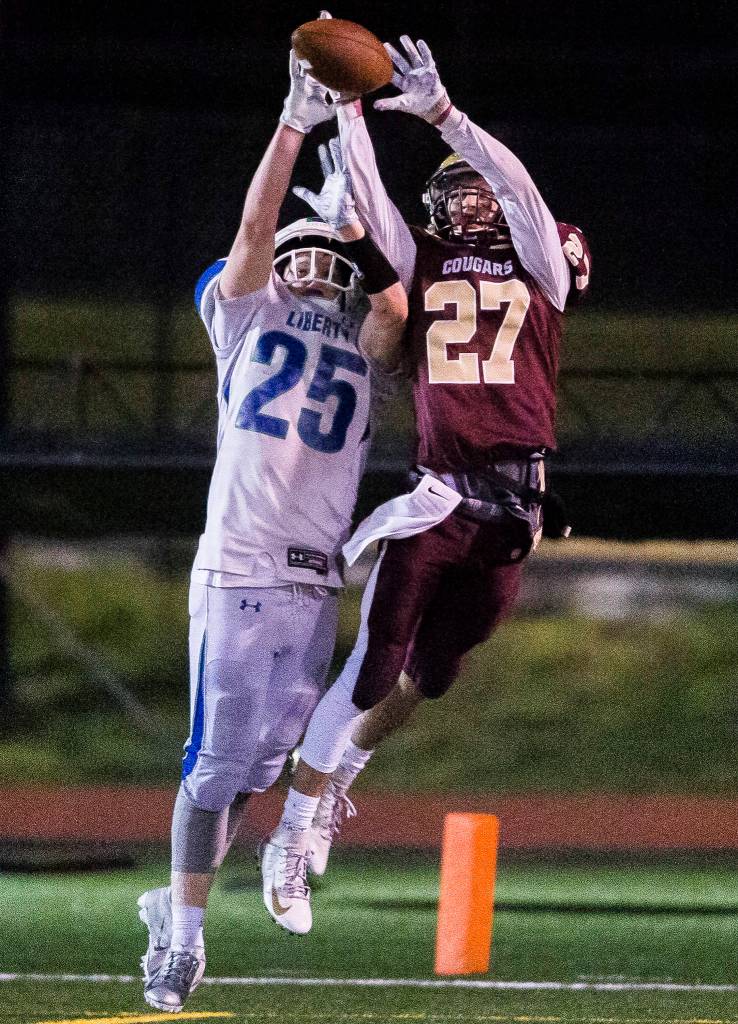 Lakewoods Shae Dixon blocks a pass in the end zone to Libertys Griffin Cour during a 2A playoff game against Liberty on Nov. 8, 2019 in Arlington, Wash. (Olivia Vanni / The Herald)