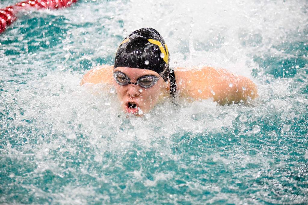 Lake Stevens Aaliyha Fricke swims the third leg of the girls 200 yard medley relay of the 4A Girls Northwest District Championship on Nov. 9 at the Snohomish Aquatic Center. Lake Stevens won with a time of 1:52.86. (Katie Webber / The Herald)