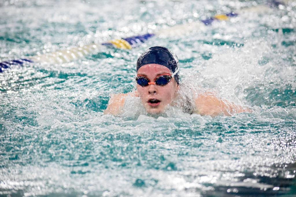 Glacier Peaks Macy Fidler swims in the girls 100 yard butterfly of the 4A Girls Northwest District Championship on Nov. 9 at the Snohomish Aquatic Center. Fidler won with a time of 57.48. (Katie Webber / The Herald)