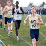 Arlingtons Vincent Loftis (650) leads the way in front of teammates Aiden Emerson (653) and Ryan Barene (647) during the Class 3A boys race at the state cross country championships Saturday at Sun Willows Golf Course in Pasco. The Eagles claimed a fourth-place team trophy. (TJ Mullinax / for The Herald)