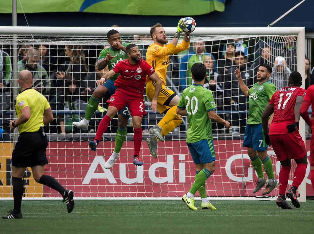 Sounders goalkeeper Stefan Frei makes a save as the Seattle Sounders beat Toronto FC 3-1 to win the MLS Cup at CenturyLink Field on Sunday, Nov. 10, 2019 in Seattle, Wash. (Andy Bronson / The Herald)