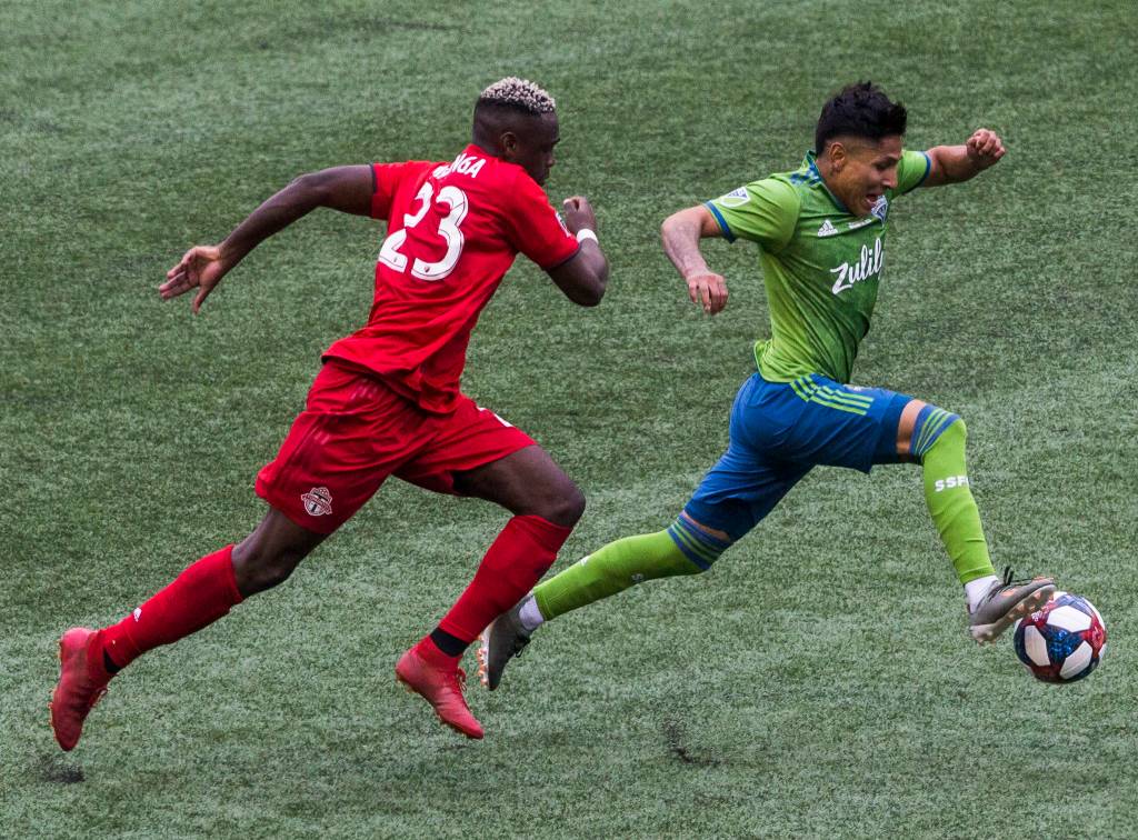 Sounders forward Raul Ruidiaz breaks away with the ball to score during the MLS Cup on Nov. 10, 2019 in Seattle, Wash. (Olivia Vanni / The Herald)