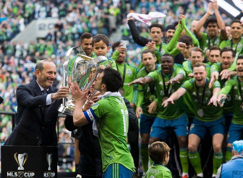 Sounders midfielder Nicolás Lodeiro kisses the MLS Cup trophy after the Seattle Sounders beat Toronto FC 3-1 to win the MLS Cup at CenturyLink Field on Sunday, Nov. 10, 2019 in Seattle, Wash. (Andy Bronson / The Herald)