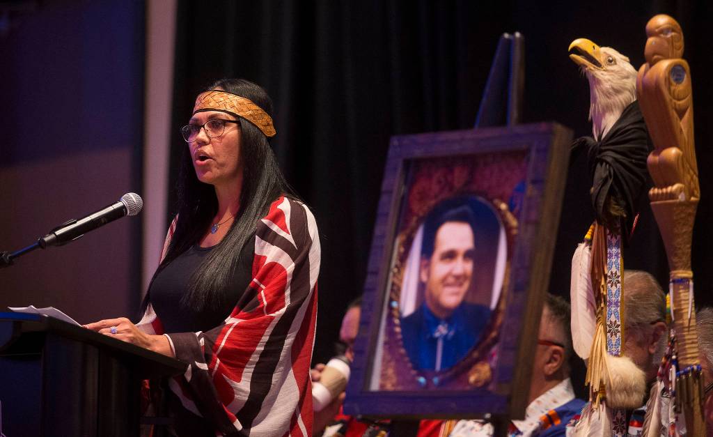 Marcie Fryberg recites a poem at the memorial for Stan Jones Sr. on Tuesday in Tulalip. (Andy Bronson / The Herald)