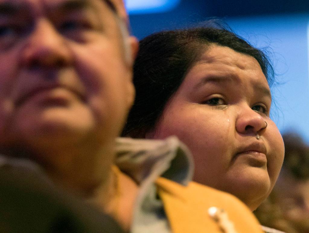 Nina Gobin sheds a tear while watching a video of the life of Stan Jones Sr. at a memorial service on Tuesday in Tulalip. Jones, 93, the longest serving board member and chairman of the Tulalip Tribes, died Nov. 5. (Andy Bronson / The Herald)