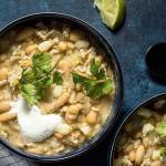 Pork chili verde is a tomato-less white and green number made with fresh poblano and jalapeno peppers, white beans, large white corn kernels (hominy) and ground pork. (Photo by Justin Tsucalas for the Washington Post)