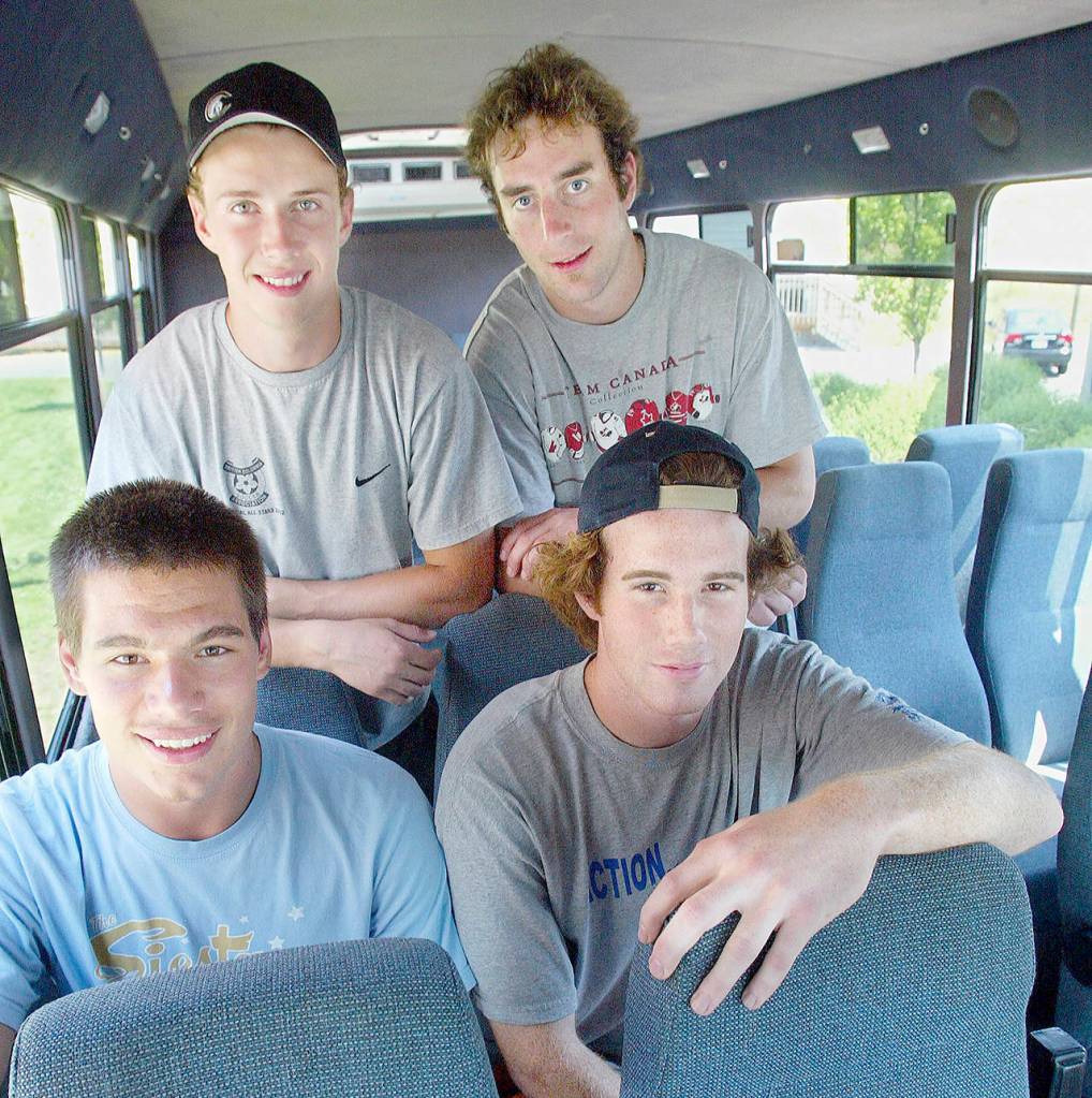 Mitch Love (top right) poses with teammates (clockwise from top left) Torrie Wheat, Jeff Harvey and Jovan Matic prior to the start of the Everett Silvertips inaugural season in 2003. (Michael OLeary / The Herald)