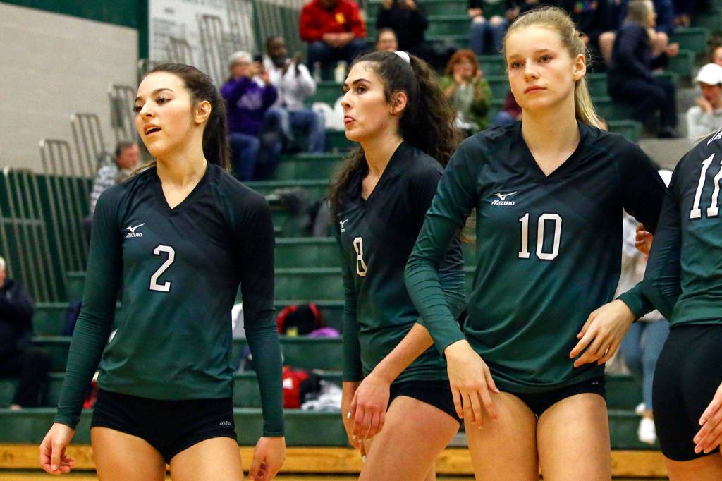 Jackson is left dejected after falling to North Creek in straight sets. (Kevin Clark / The Herald)