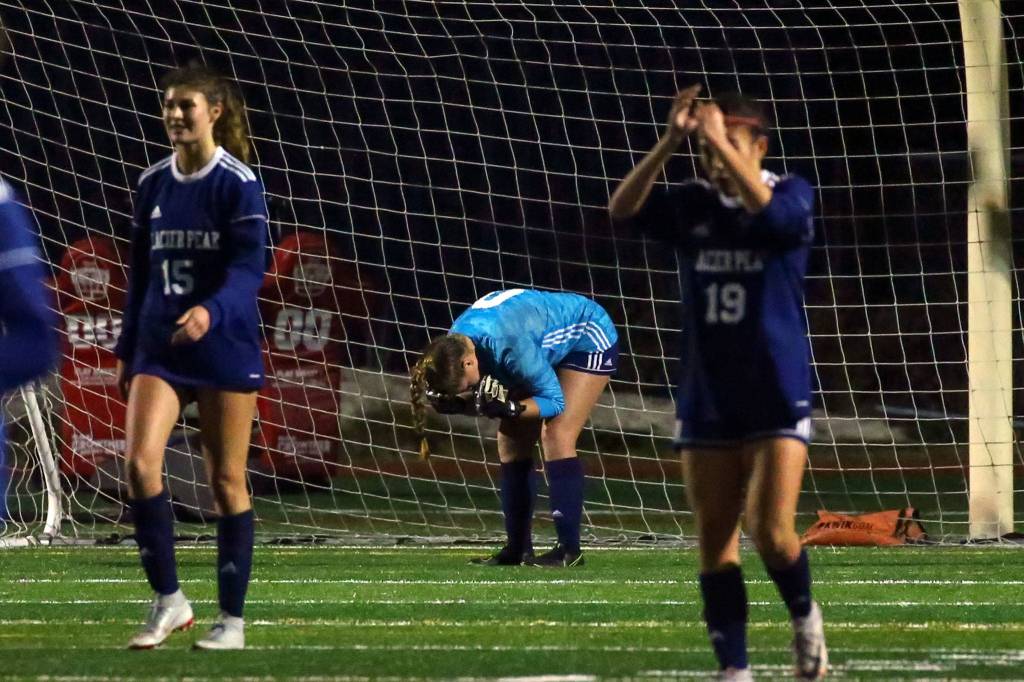 Glacier Peak reacts to late winning goal against Sumner Wednesday evening at Glacier Peak High School in Snohomish on November 13, 2019. Sumner won 2-1. (Kevin Clark / The Herald)