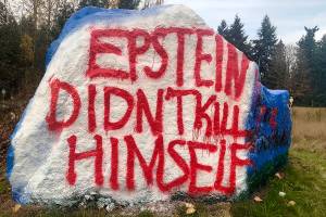 A cryptic meme splashes the usually benign rock of Snohomish