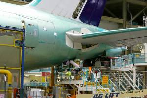 A Boeing Co. 777 airplane is shown on the assembly line, Monday, June 12, 2017, in Everett, Wash. (AP Photo/Ted S. Warren)