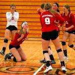 Snohomish player celebrate their state berth after a win over Oak Harbor in a 3A District 1 Tournament semifinal Thursday evening at Marysville Pilchuck High School. Snohomish won in straight sets. (Kevin Clark / The Herald)
