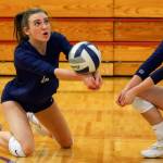 Arlingtons Malia Shepherd makes a dig against Ferndale Thursday evening at Marysville-Pilchuck High School on November 14, 2019. (Kevin Clark / The Herald)