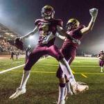 Lakewoods Carson Chrisman (left) celebrates after scoring a touchdown during a 2A state playoff game against Sequim on Friday in Arlington. (Olivia Vanni / The Herald)