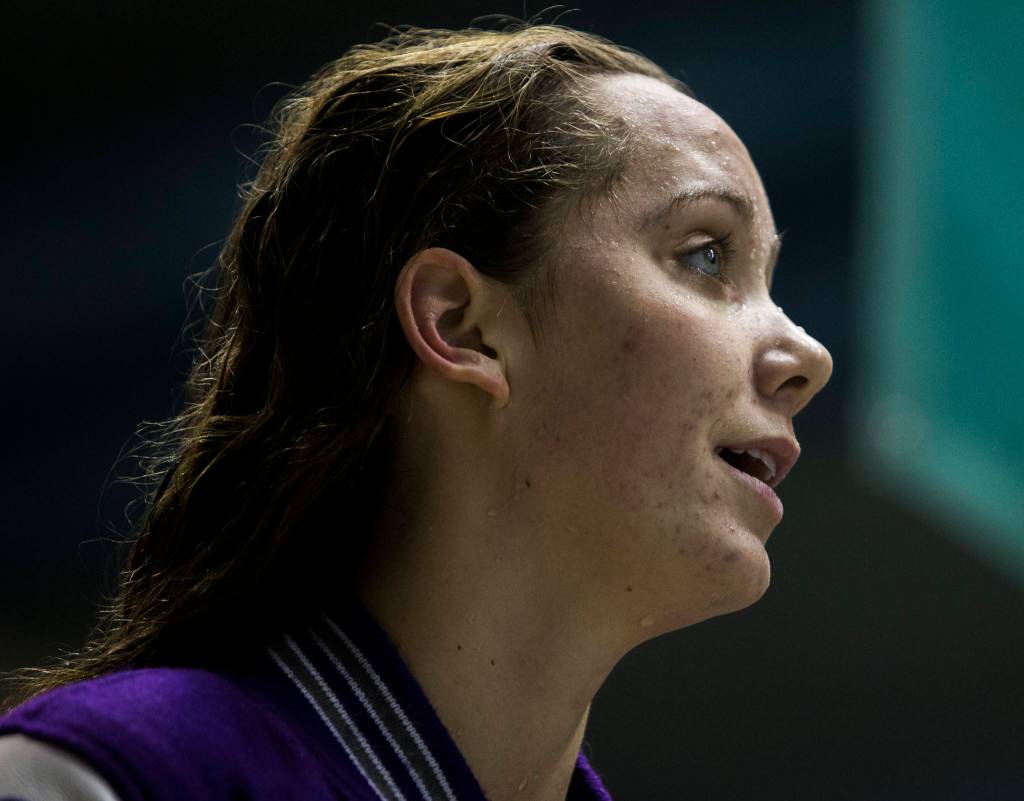 Kamiaks Eli Straume smiles as she looks up at her time on the board during the 2019 4A Girls State Swim and Dive Championship on Nov. 16, 2019 in Federal Way, Wash. (Olivia Vanni / The Herald)
