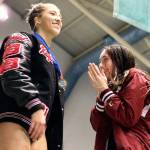 Snohomishs Kayli Kersavage and Mercer Islands Brooke Andrews on the champions podium Saturday evening during the 3A Girls Swim & Dive Championship at King County Aquatics Center in Federal Way on November 16, 2019. (Kevin Clark / The Herald)