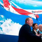 Boeing Commercial Airplanes president and CEO Stanley A. Deal (left), Air Astana chief planning officer Alma Aliguzhinova (center) and Air Astana chief operating officer Anthony Regan (right) pose after a news conference at the Dubai Airshow in Dubai, United Arab Emirates, on Tuesday. (AP Photo/Jon Gambrell)