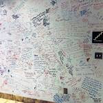 Members signed a wall with goodbyes near a stairway in the lobby of the former Everett YMCA before it closed Nov. 16. (Stephanie Davey / The Herald)