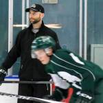 Everett Silvertips assistant coach Mitch Love looks on during a practice session in 2015. (Kevin Clark / Herald file)