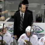 Assistant/strength and conditioning coach Mitch Love at home in a pre-season game against the Thunderbirds in 2011. (Jennifer Buchanan / Herald file)