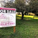 A real estate sign at the site of the proposed Lake Stevens Costco bears the name of Lake Stevens City Councilman Marcus Tageant. (Chuck Taylor / The Herald)