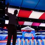 Media are given directions Tuesday in preparation for Wednesdays Democratic Presidential Primary Debate in Atlanta. (AP Photo/John Amis)