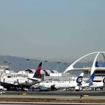 In this 2013 photo, airplanes sit on the tarmac at Los Angeles International Airport. (AP Photo/Gregory Bull,File)