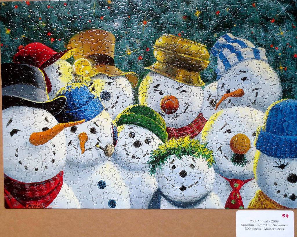 For their 25th annual Christmas puzzle, Suzie Nelson and Sonya Shipley put together Sunshine Committee Snowmen. (Suzie Nelson)