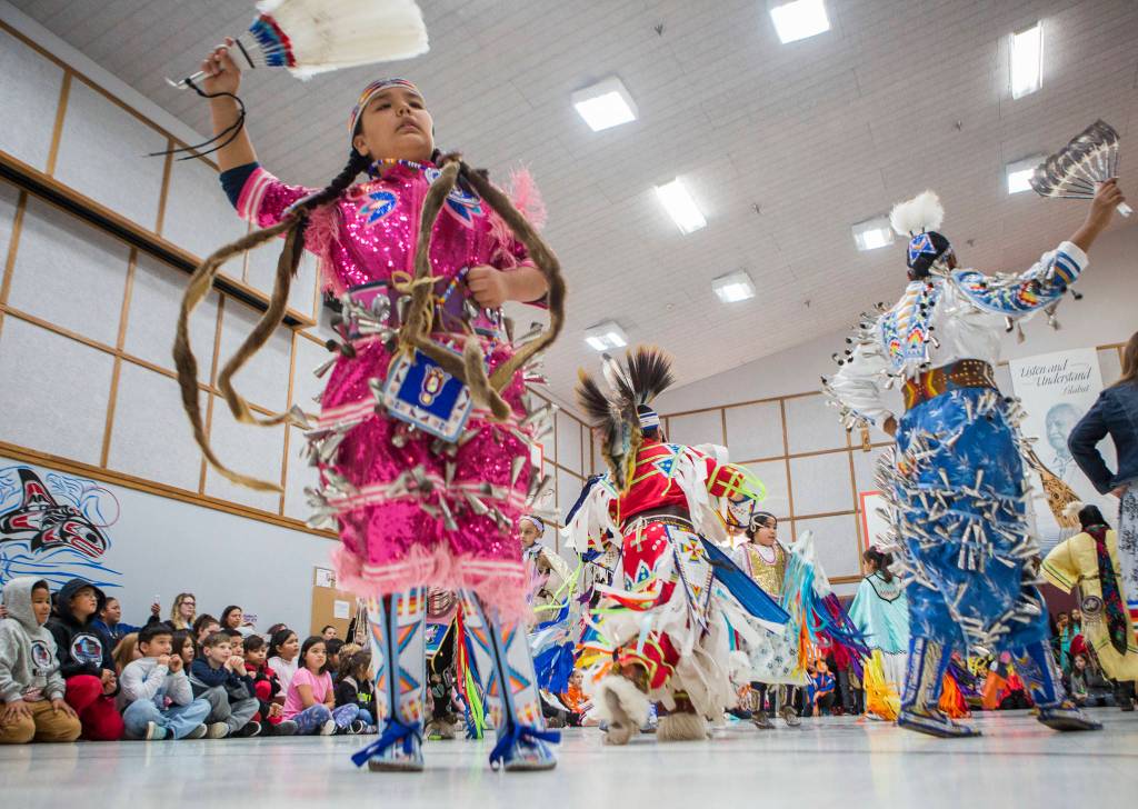 Maleia Kickingwoman dances in a pink jingle dress during Tulalip Day at Quil Ceda Tulalip Elementary on Wednesday in Tulalip. (Olivia Vanni / The Herald)