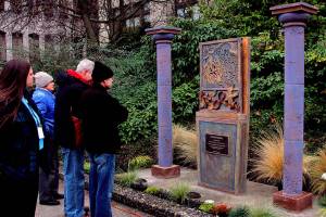 A crowd of about 50 people attended the dedication ceremony for the AIDS Memorial of Snohomish County in December 2005. A World AIDS Day event is scheduled for 2 p.m Sunday at the memorial, located west of the Mission Building on the Snohomish County Campus. (Herald file photo by Michael OLeary 12/01/05)