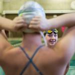 Emma Olsen talks with a teammate during swim practice at Explorer Middle School on Nov. 6, 2019 in Everett, Wash. (Olivia Vanni / The Herald)