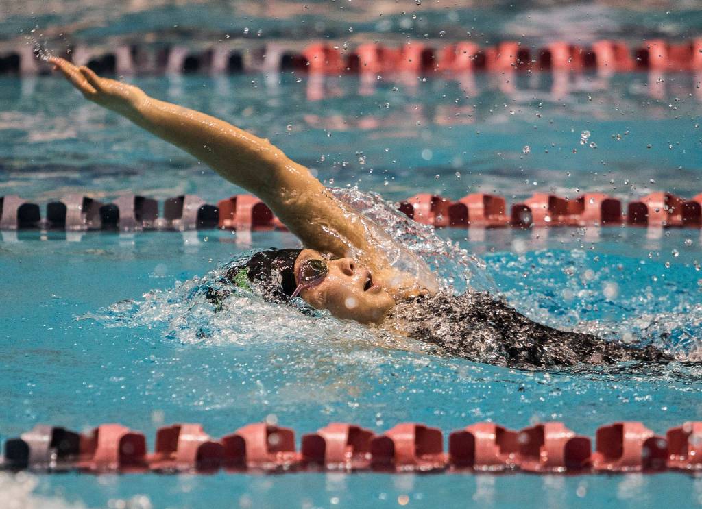 Jacksons Mia Chang swims the 200 yard IM during the 2019 4A Girls State Swim and Dive Championship on Nov. 16, 2019 in Federal Way, Wash. (Olivia Vanni / The Herald)