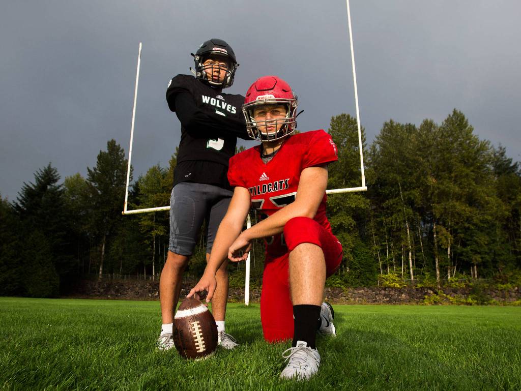 Jackson kicker Daniel Yoon, left, and Archbishop Murphy long snapper Tommy Sullivan at Henry M. Jackson High School on Monday, Sept. 9, 2019 in Mill Creek, Wash. (Olivia Vanni / The Herald)