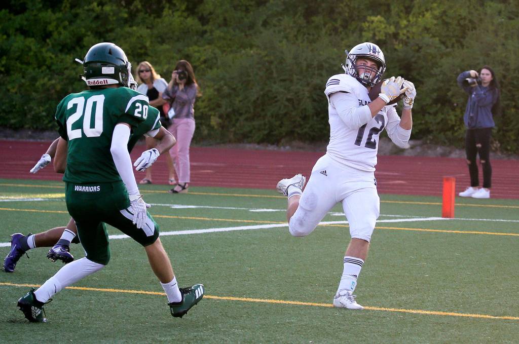 Glacier Peaks Brayden Corwin hauls in a pass for a touchdown as Glacier Peak beat Edmonds-Woodway 35-14, in their season opening football game for both teams, at Edmonds Stadium on Friday, Sept. 6, 2019 in Edmonds, Wash. (Andy Bronson / The Herald)