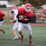 Marysville Pilchuck running back Dylan Carson avoids a tackle during practice on Thursday, Oct. 17, 2019 in Marysville, Wash. (Andy Bronson / The Herald)