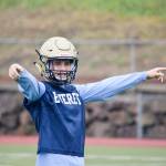 Everetts Cody Bennett talks to his teammates before a defensive play at Everett Memorial Stadium on Wednesday, Aug. 21. (Katie Webber / The Herald)