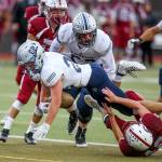 Glacier Peaks Dylan Owen crosses the goal line for a touchdown as the ball is stripped from his arms. Glacier Peak took on Cascade in football at Everett Memorial Stadium on Friday, Oct. 4, 2019 in Everett, Wash. (Andy Bronson / The Herald)