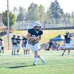 Junior Ryan Black catches the ball at Glacier Peak High School on Tuesday, Aug. 27. (Katie Webber / The Herald)
