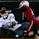 Meadowdales Colton Walsh attempts a catch with Snohomishs Hunter Philabaum trailing Friday evening at Veterans Memorial Stadium in Snohomish on October 25, 2019. (Kevin Clark / The Herald)